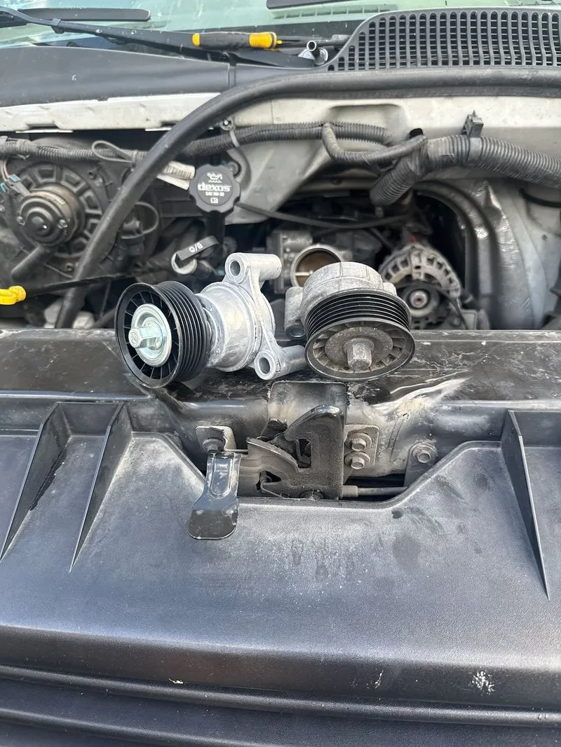 New OEM water pump installed on a 2016 GMC Savana during a same-day on-site repair in Kelowna